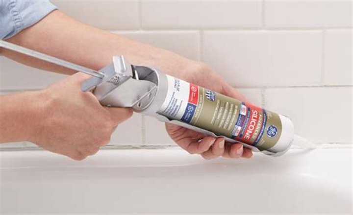 Is caulk an adhesive?